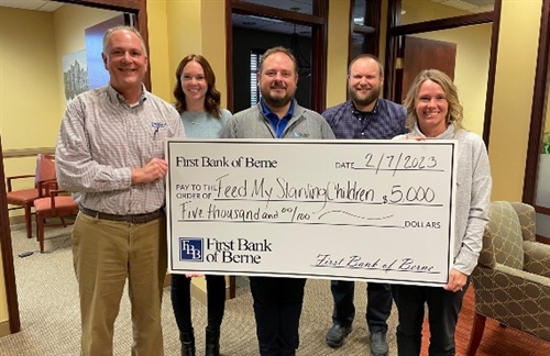 FIRST BANK OF BERNE DONATES TO FEED MY STARVING CHILDREN